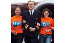 Delighted: Bill Nighy with NSE fundraisers and easyJet staff 