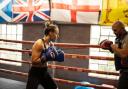 Raven Chapman (left) gets trained by Stuart Scott (right) at High Wycombe Boxing Club