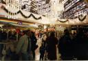 Looking E towards C and A's store, a busy Christmas shopping scene in the Chiltern Centre, off Frogmoor, High Wycombe. c1990