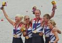 Naomi Riches, second right, celebrates gold with her mixed cox four crew