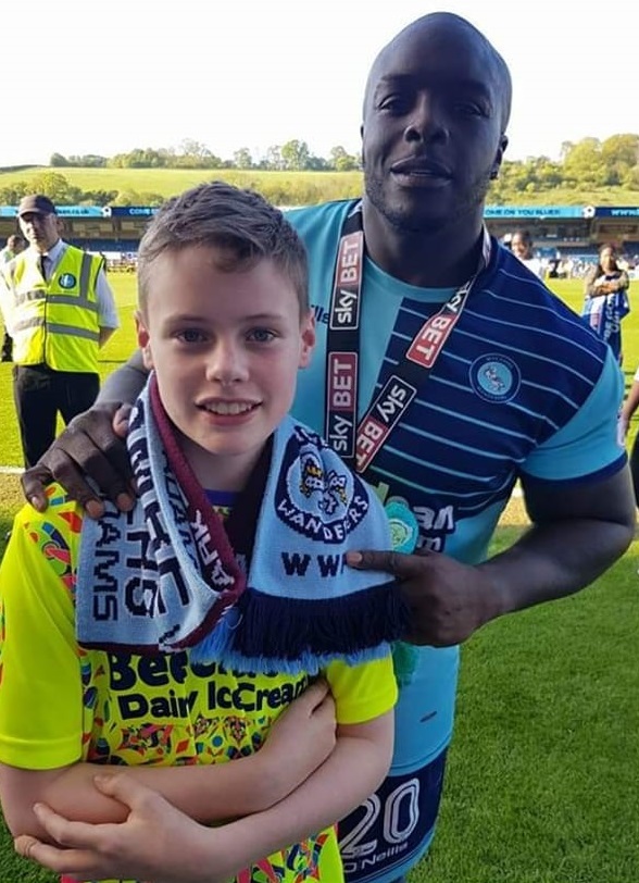 A day to remeber for this young supporter: Promotion for Wanderers and a pic with a legend in May 2018 (Melanie Jane Bailey)