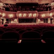A row of Theatre seats. Credit: Canva