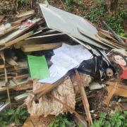 Amersham woods fly-tip contains confidential waste and ADDRESS