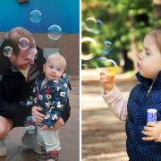 Tristan, who is 17-months-old, enjoying the bubbles and boogie fun with his dad (left)