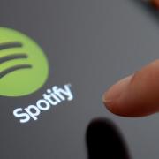 Spotify's Playlist in a Bottle feature allows you to create a playlist that will be locked until January 2024