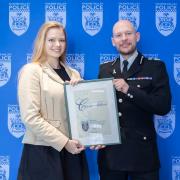 Marie Gumpert with her commendation from Chief Constable Jason Hogg