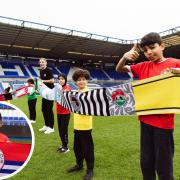 Reading badge one of 74 football clubs featured on the world's longest scarf