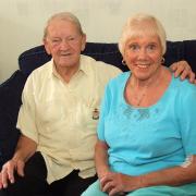 Sheila Ann Anderson who was saved by doctors after a sudden blood clot - also with her husband Edward