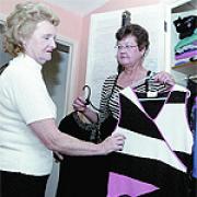 Wardrobe consultant Janet Burrows giving a client advice on sorting out her wardrobe - Picture by ANITA ROSS MARSHALL  053055 P12