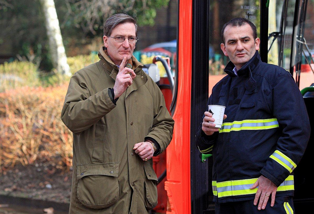 MP Dominic Grieve visits flood hit residents in Pound Lane, Marlow.