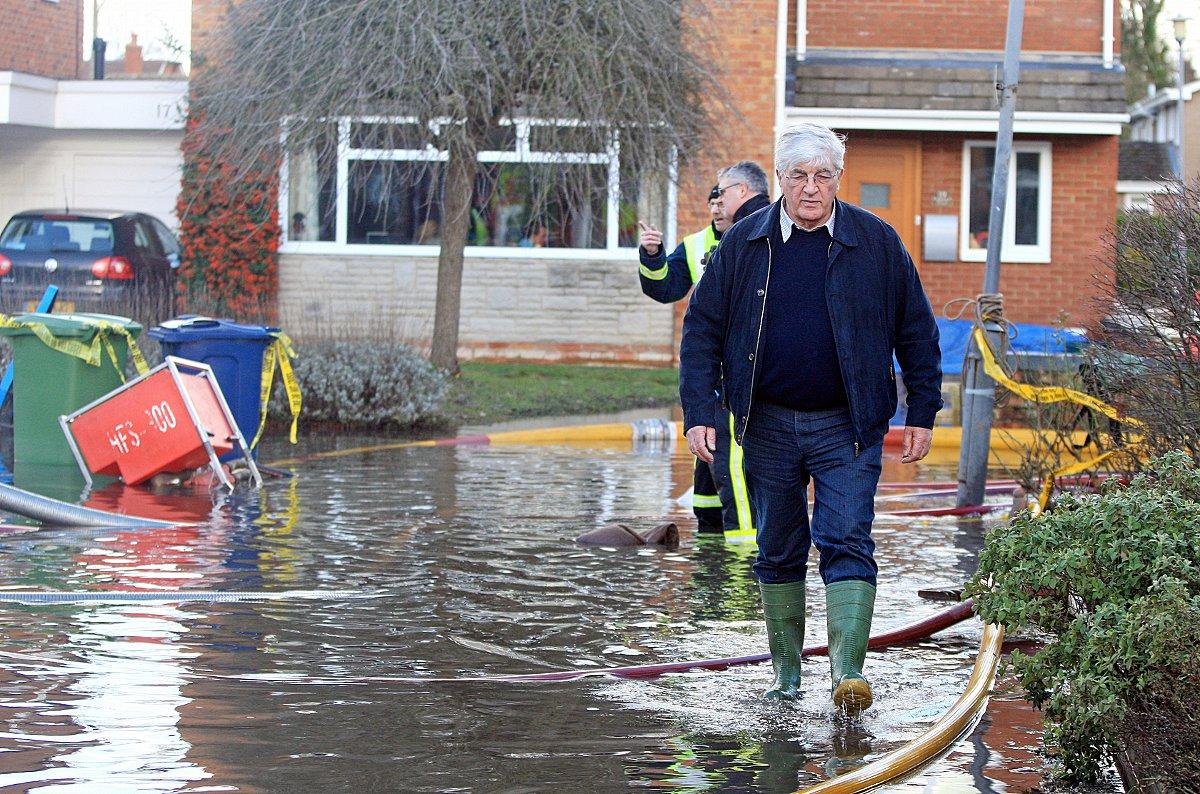 WDC leader Richard Scott visits flood hit residents in Pound Lane, Marlow.