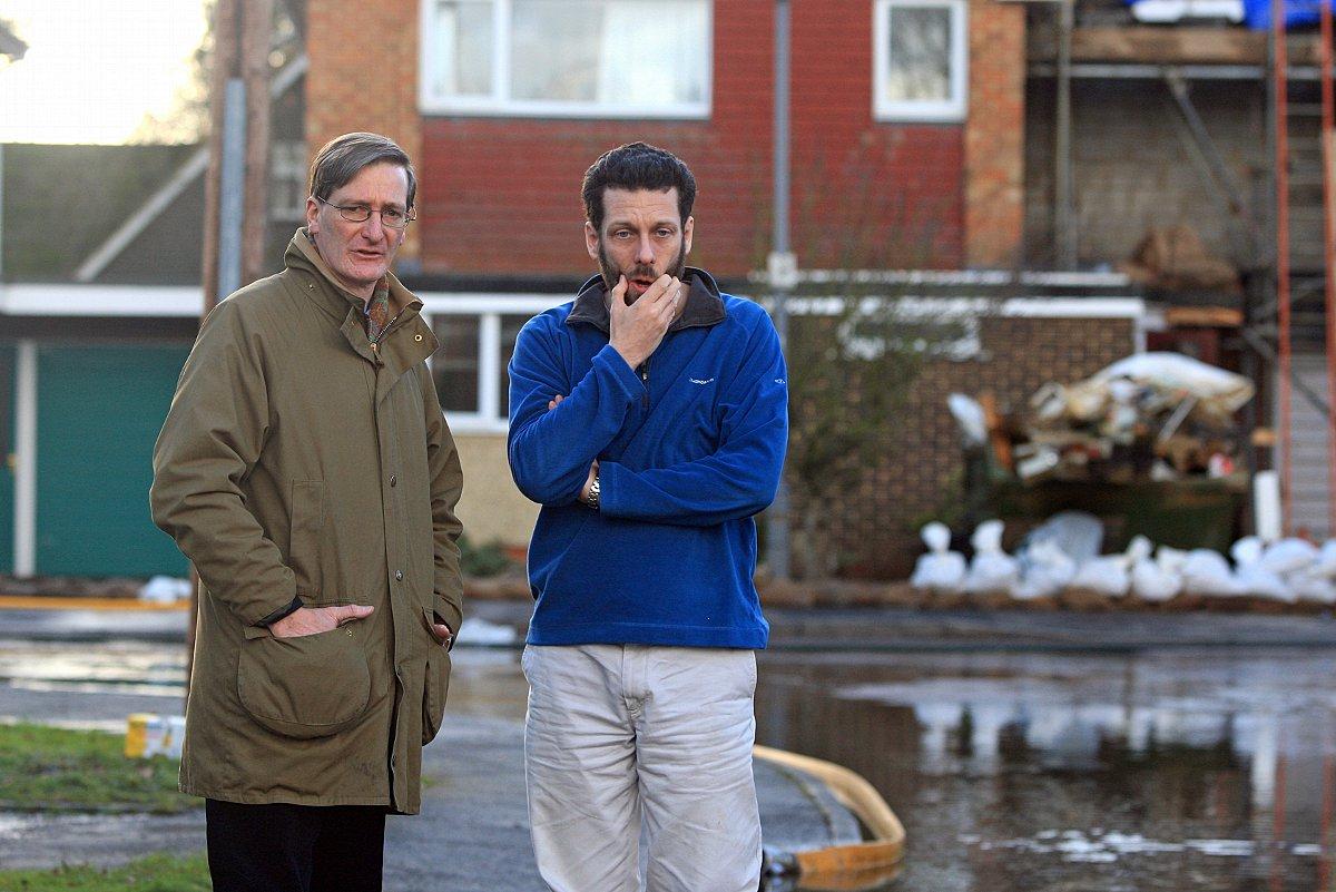 MP Dominic Grieve visits flood hit residents in Pound Lane, Marlow.