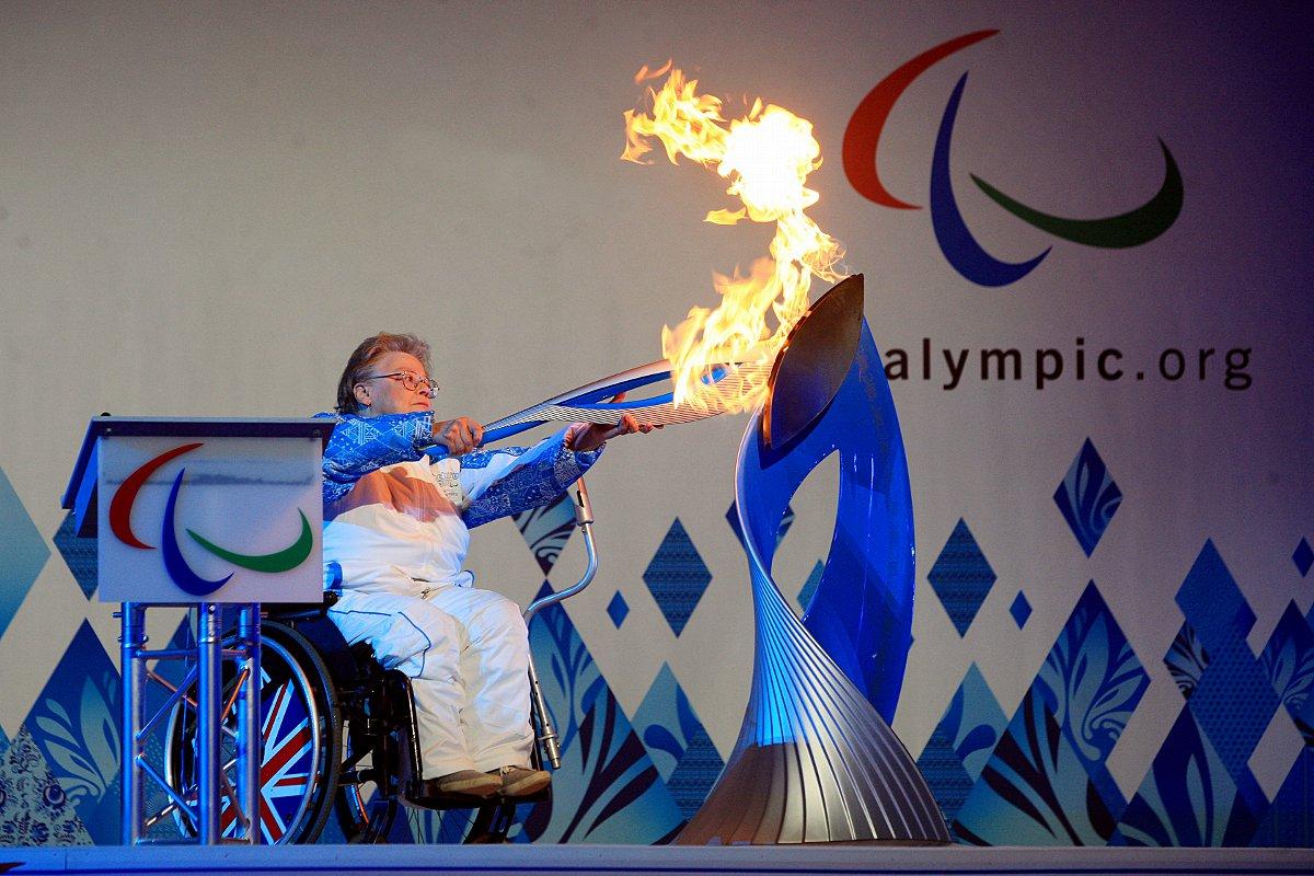 Caz Walton lights the Sochi 2014 Winter Paralympic Torch and Cauldron