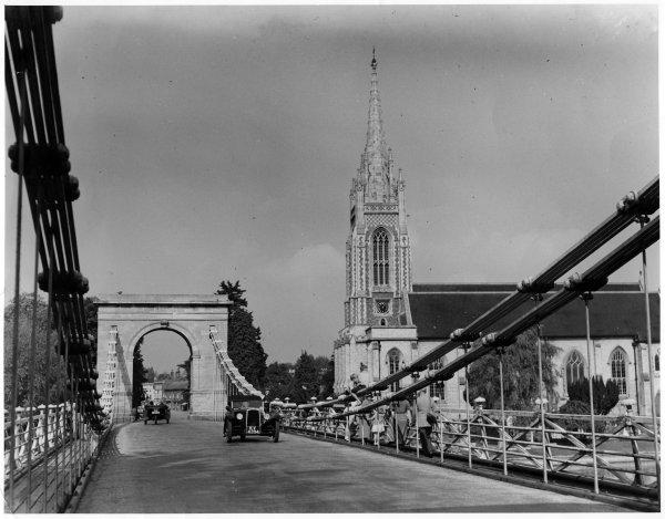 View N from the southern end, of the bridge and parish church, with three wheeled cars crossing the bridge in each direction. Marlow, 1935.