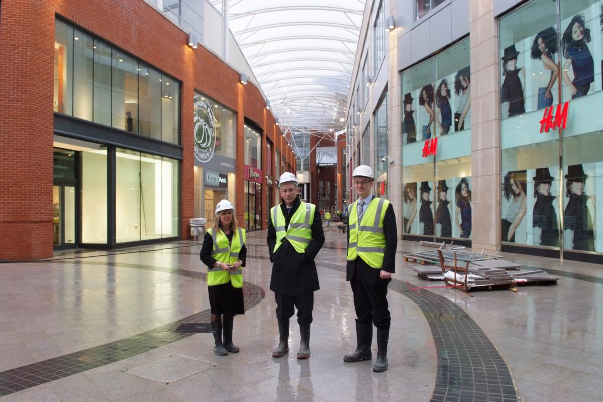 Former BFP editor Steve Cohen (centre) is given a tour round the new centre