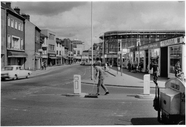 Looking east from near Temple Street, a view temporary shops and the Octagon under construction in Oxford Street, High Wycombe. January 1970