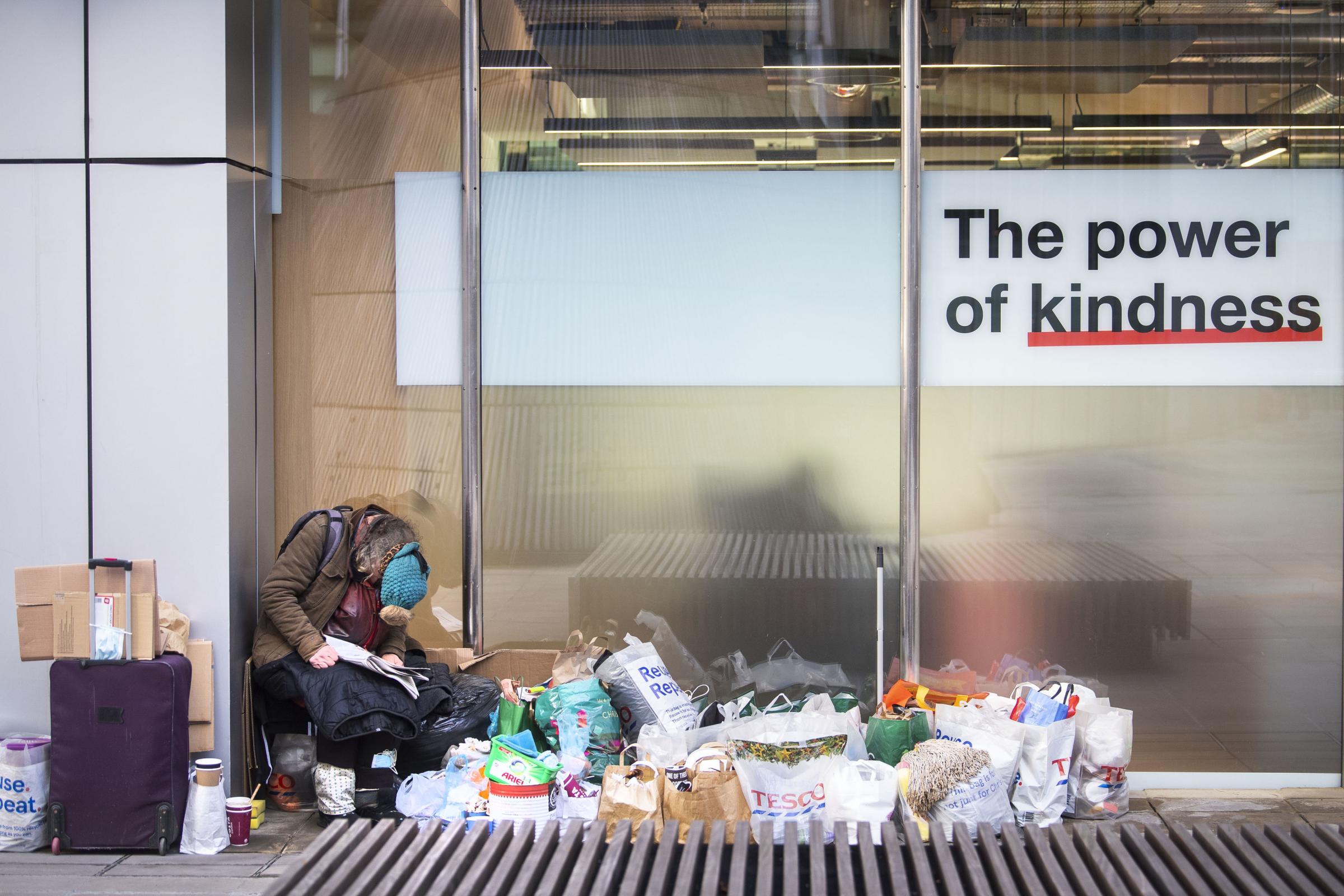 File photo dated 25/1/2021 of a homeless person sits in a window in the City of London. The number of rough sleepers known to be living on Londons streets has risen by almost a quarter in three months, figures show. Issue date: Friday January 29, 2021. 