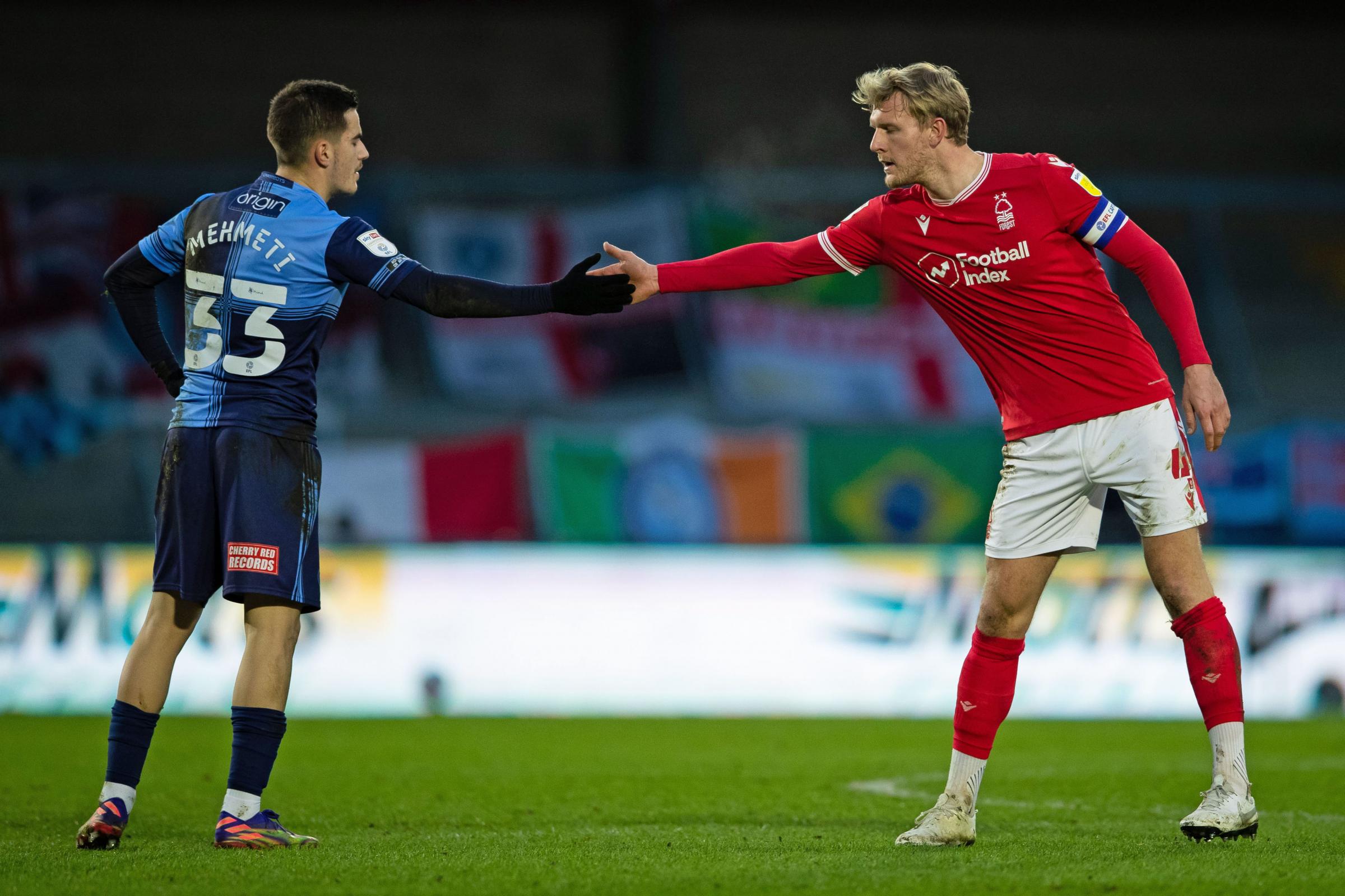 Anis Mehmeti and Joe Worrall shake hands as Wycombe loss to Forest (Aaron Chown/PA)