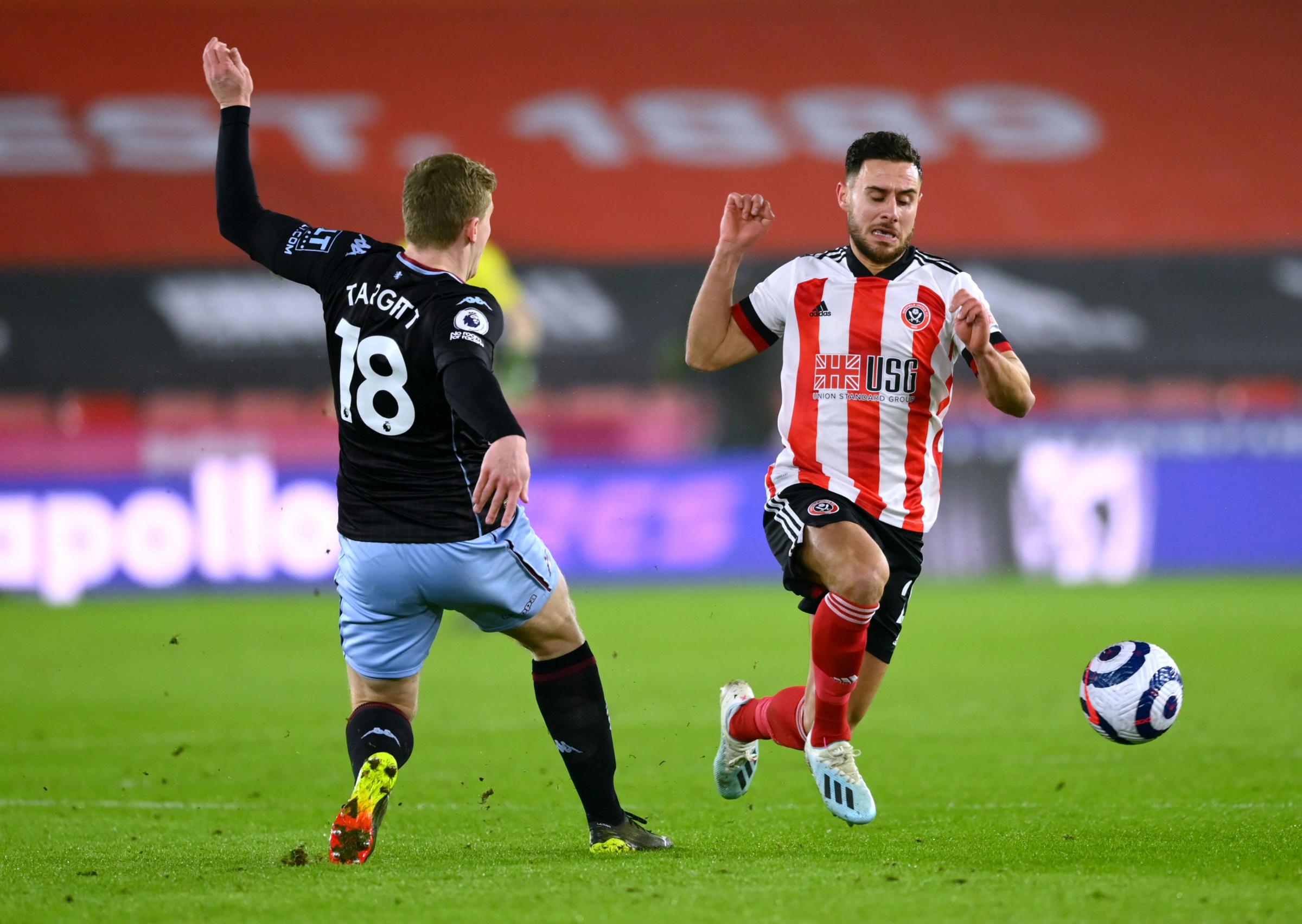 George Baldock (right) has been at Sheffield United for four seasons (PA)