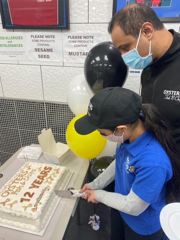Bucks Free Press: Owner, Gav Singh and daughter Gia cutting the cake