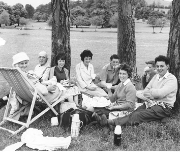 BFP05099 This group are enjoying a picnic in Hughenden Park, summer 1962.