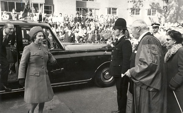 The Queen and HRH the Duke of Edingburgh greeted by Chancellor McMillan and PC Lock 1976. Credit: TVP