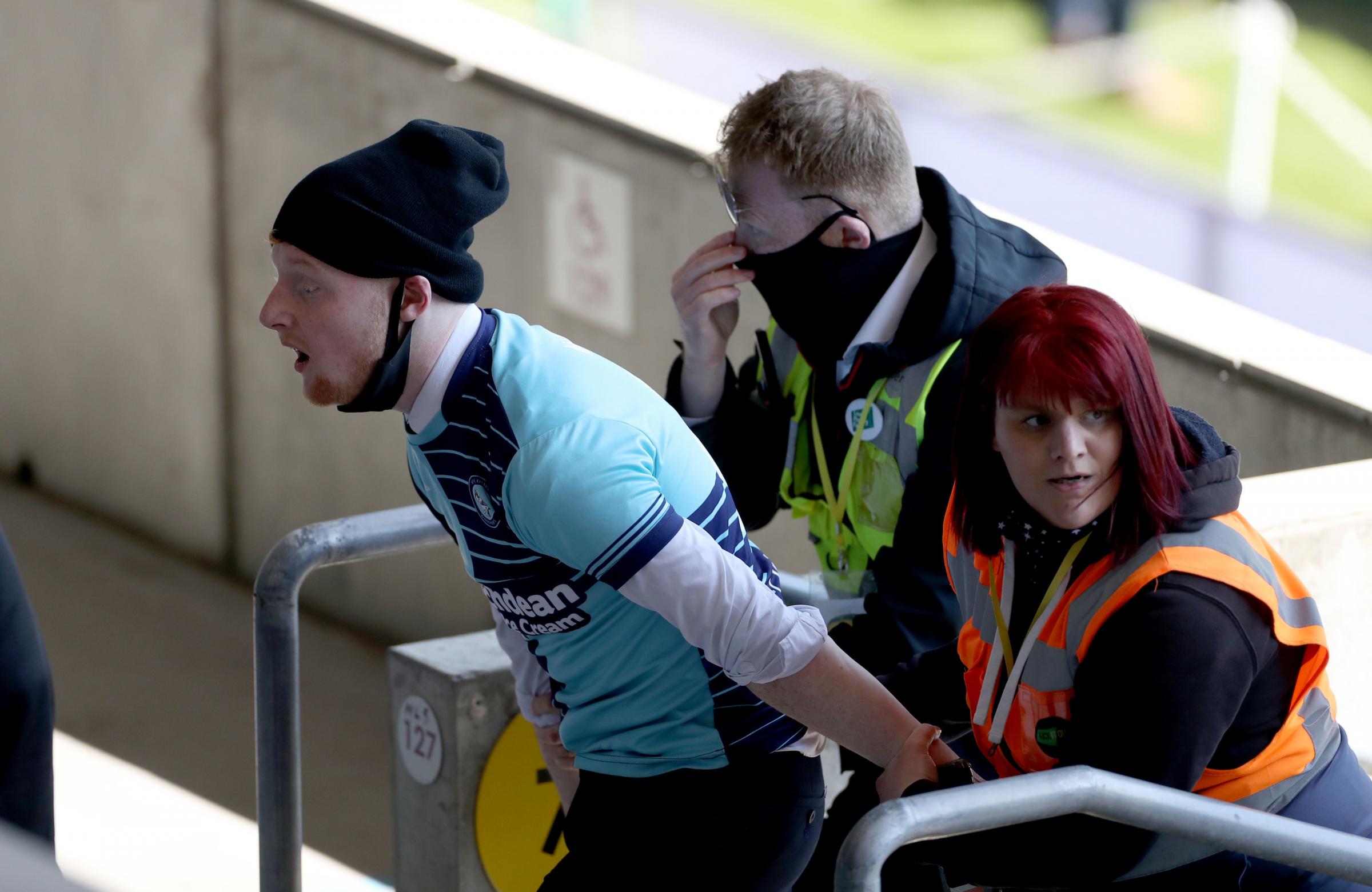 The Wycombe fan was seen at the Liberty Stadium on April 17 (PA)