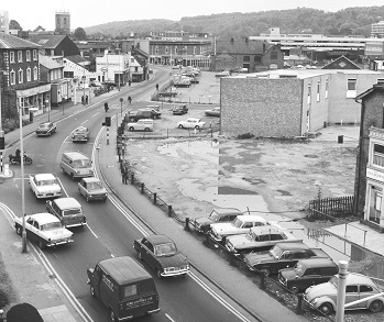 An elevated view looking towards the town centre from the then council offices along Oxford Rd after the culverting of the river Wye, 1969. Redevelopment of the cleared area south of the river has not yet begun