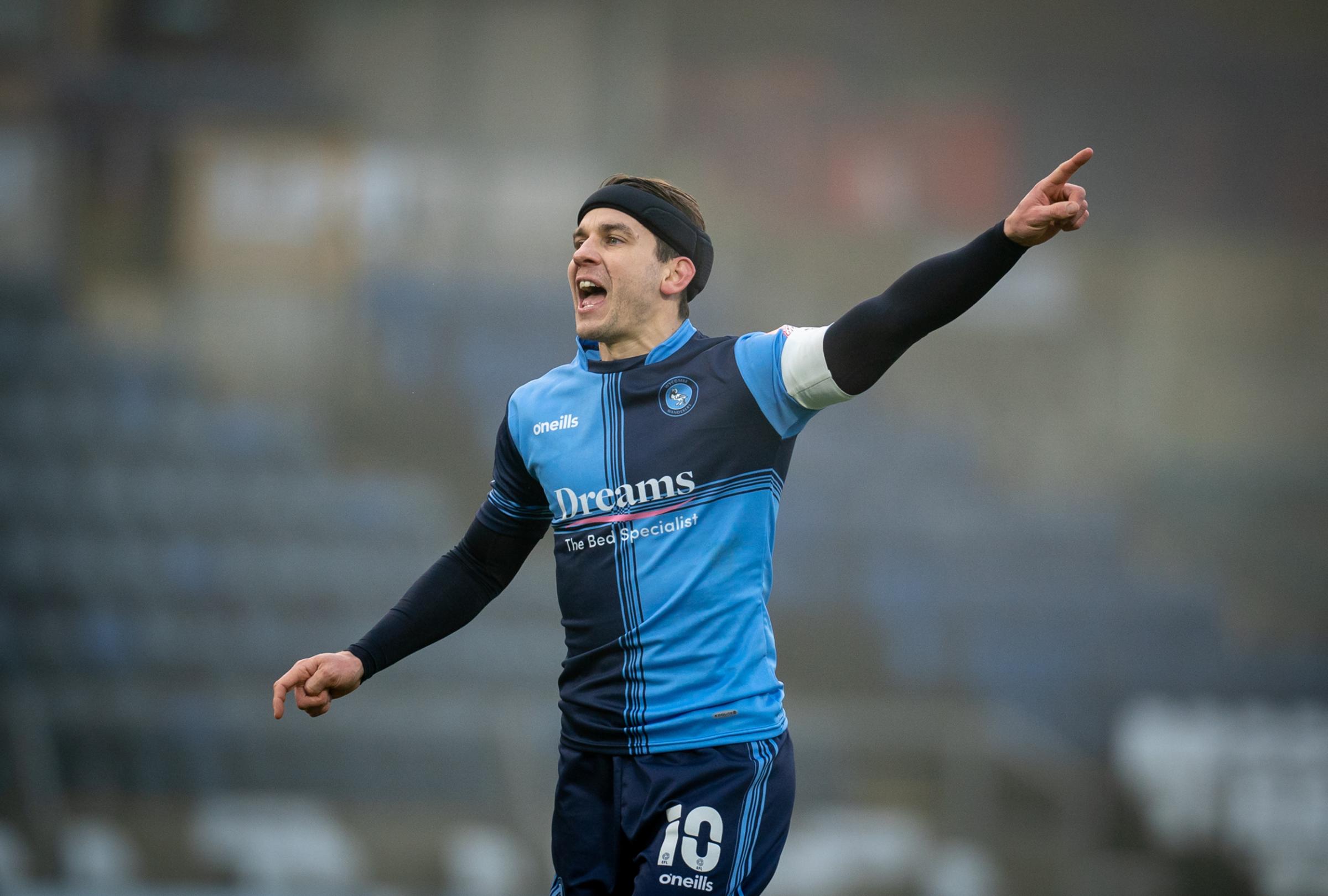 Matt Bloomfield played 19 matches this season across three competitions, scoring once. Here he is ordering his team in the 4-1 win against Preston North End in the FA Cup on January 9 (Adams Park) 