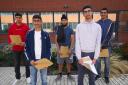 Students at Khalsa Secondary Academy in Stoke Poges celebrating getting their results