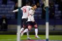 Bolton Wanderers' Josh Sheehan celebrates scoring his side's second goal at the University of Bolton Stadium in their 2-0 win over Crewe on November 12 (PA)