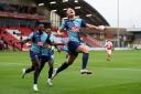 Alex Samuel celebrates scoring Wycombe's fourth in the 4-1 win over Fleetwood Town (PA)