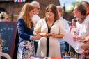 Princess Beatrice (left) and Princess Eugenie attend the Coronation Big Lunch in Chalfont St Giles, Buckinghamshire