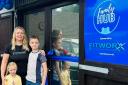 Kimberly Parker (pictured with her two children at the grand opening on September 16) is the owner and founder of the Family Hub