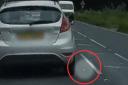 Driver is slapped with a fine after throwing out a cigarette