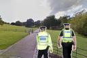 Man arrested on suspicion of rape after woman is attacked in park