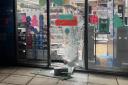 Smashed window after break-in at Buckinghamshire supermarket