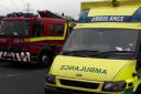 Ambulance treats man after Christmas tree lights catch fire