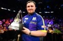 Luke Littler became the youngest major champion by winning the Premier League (Zac Goodwin/PA)
