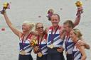 Naomi Riches, second right, celebrates gold with her mixed cox four crew