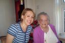 Volunteer Sally-Ann Matthews with 108-year-old Margaret Cooke