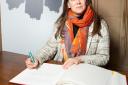 Sarah Green pictured signing the Holocaust Educational Trust’s Book of Commitment