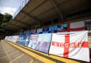 Some of the Wycombe flags that were put up at Adams Park during the Covid season of 2020/21 (PA)
