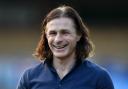 Gareth Ainsworth was all smiles as Wycombe defeated Burton 3-0 on the opening weekend of the season (PA)