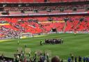 The Wycombe players formed a huddle after their League One play-off final defeat against Sunderland