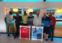 A Manchester United and Wycombe Wanderer shirt were won during the charity event on Friday