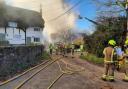 Police road closure after 'huge' house fire in Bucks