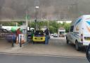 A man filling up fuel in Asda, High Wycombe