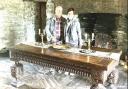 The Elizabethan table restored to Gwydir Castle, with the donors John and Maureen Winn.