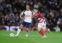 Tottenham Hotspur's Xavi Simons (left) and Doncaster Rovers Owen Bailey (right) battle for the ball during the Carabao Cup third round match at the Tottenham Hotspur Stadium, London. Picture date: Wednesday September 24, 2025. PA Photo. Photo credit